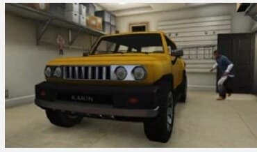 Yellow vehicle in a garage